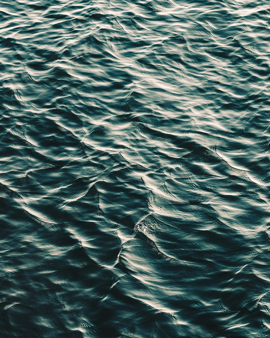 DOSE Blue Drift story image - rippling dark teal sea water
